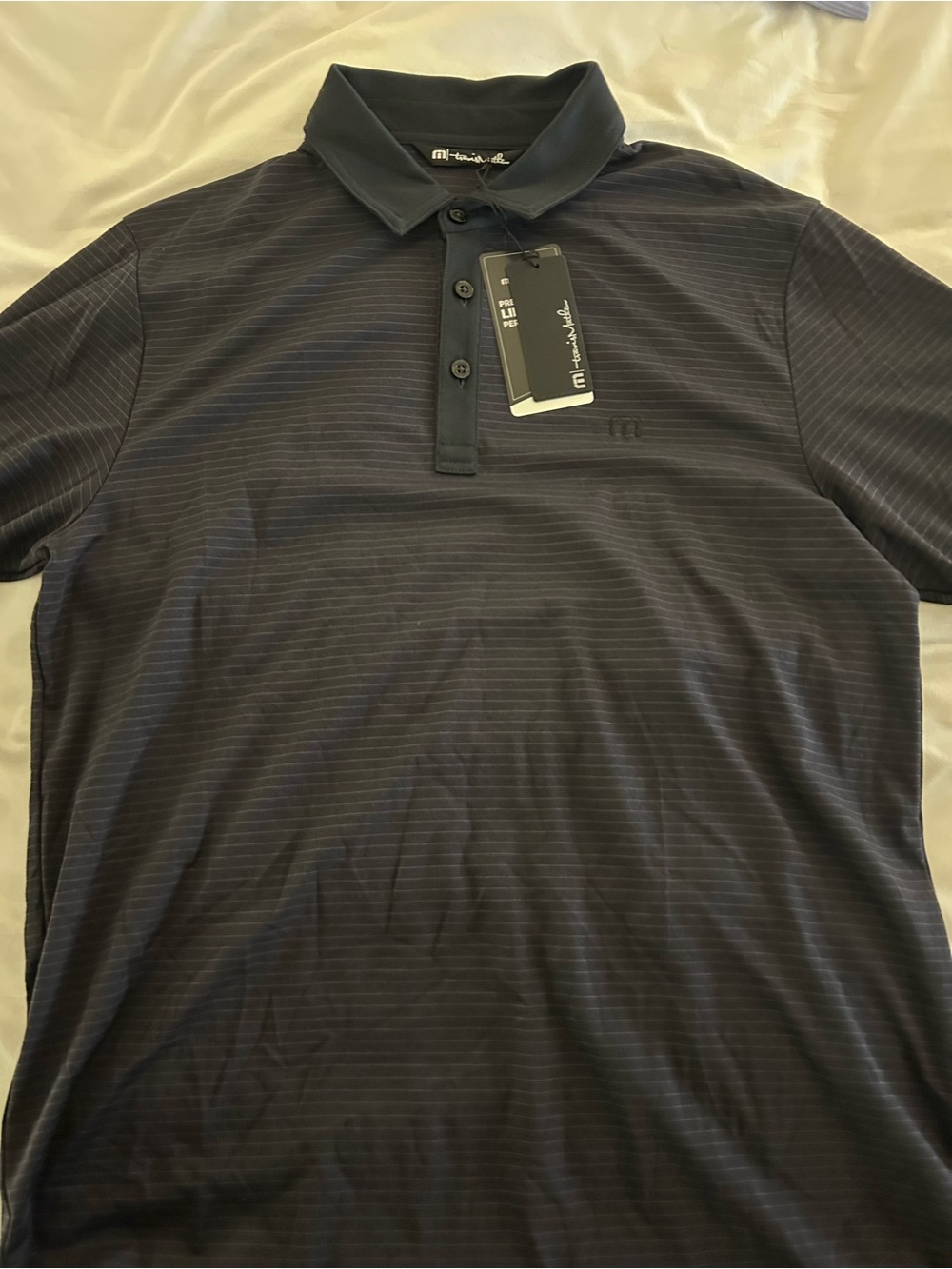 Travis Mathew Men’s Black Stripe Polo Shirt